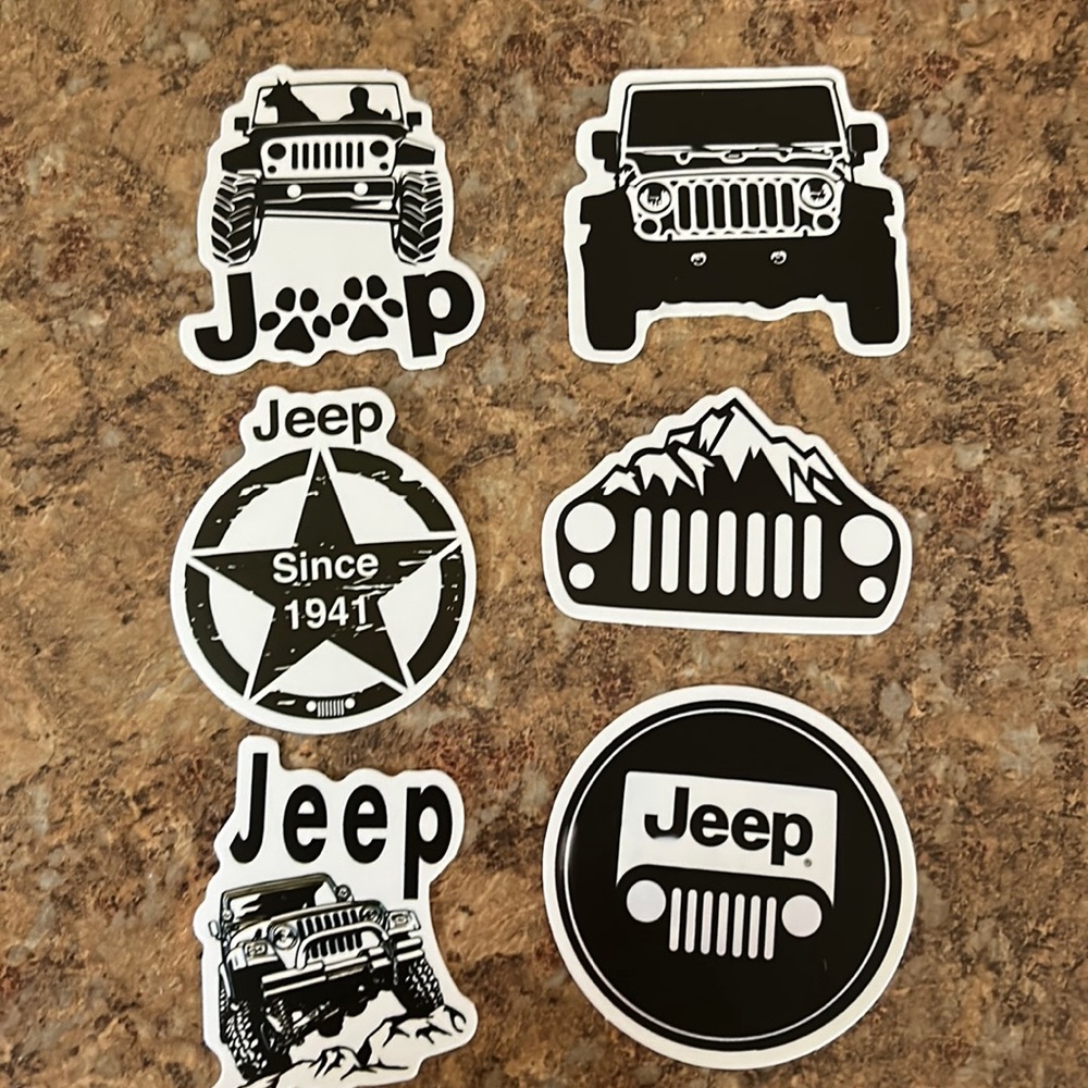 Six black and white jeep stickers